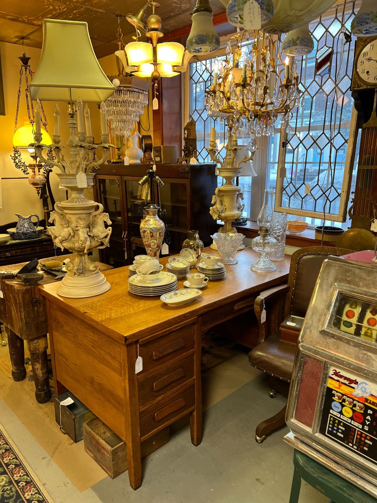 Antique chandeliers and desk